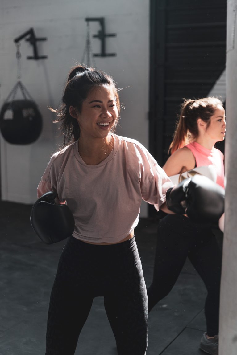 woman boxing in gym class