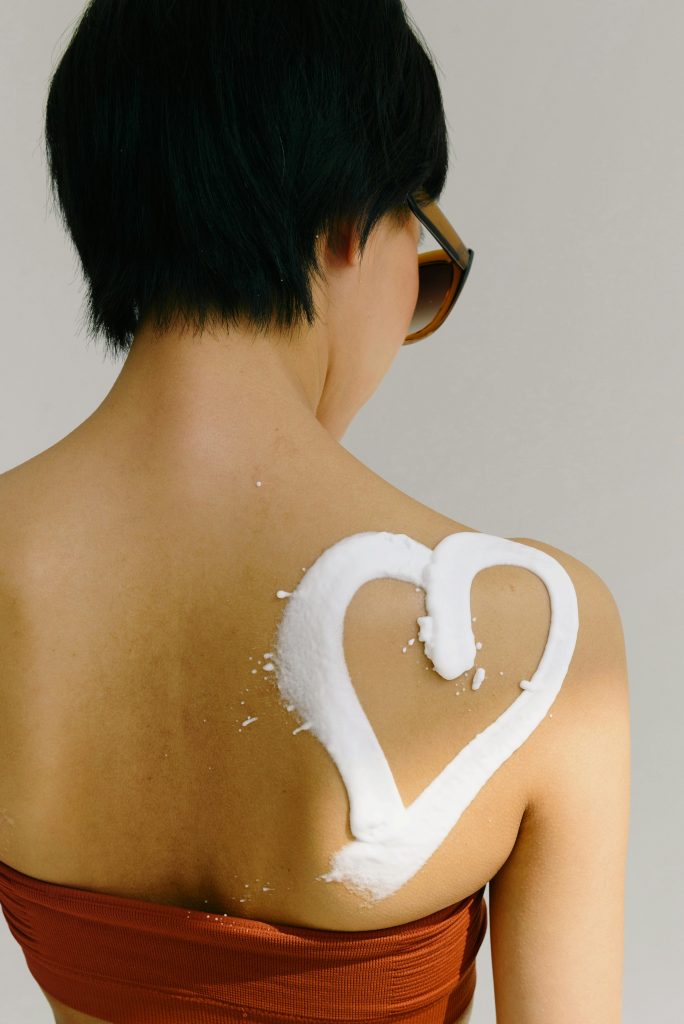 suncream on back in a heart shape