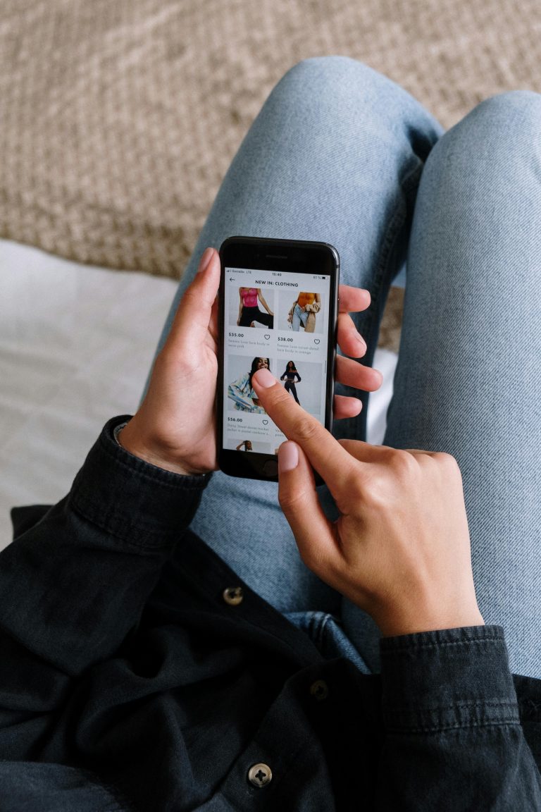 woman online shopping on phone