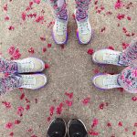 group of women in running shoes