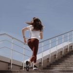 woman running up stairs