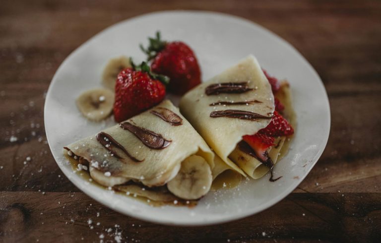 crepe style pancakes with strawberries