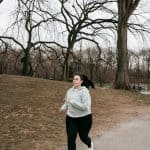 Beginner runner training for a 10K in the park