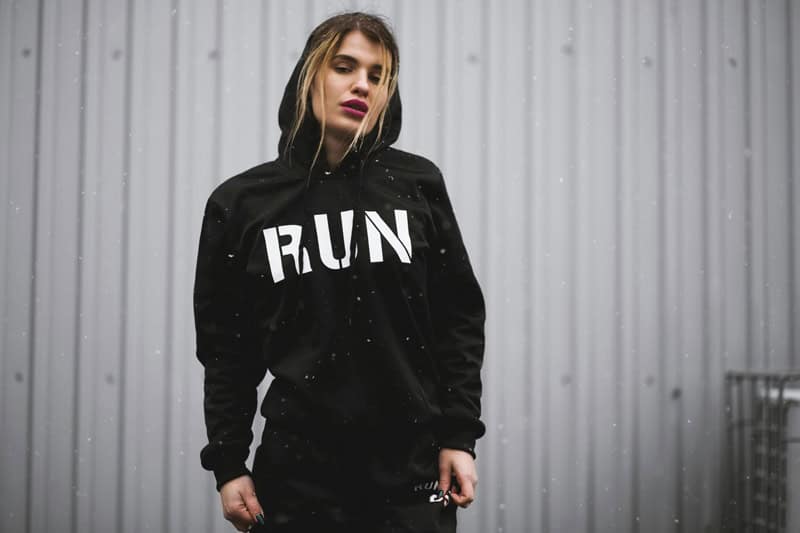 woman in a run hoodie